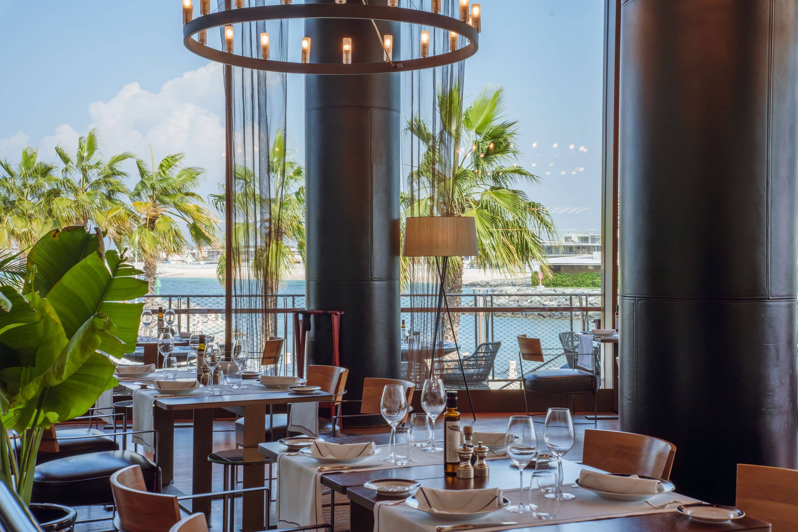 Bvlgari Yacht Club Dubai dining room overlooking Jumeirah Bay for Easter 2026 brunch.