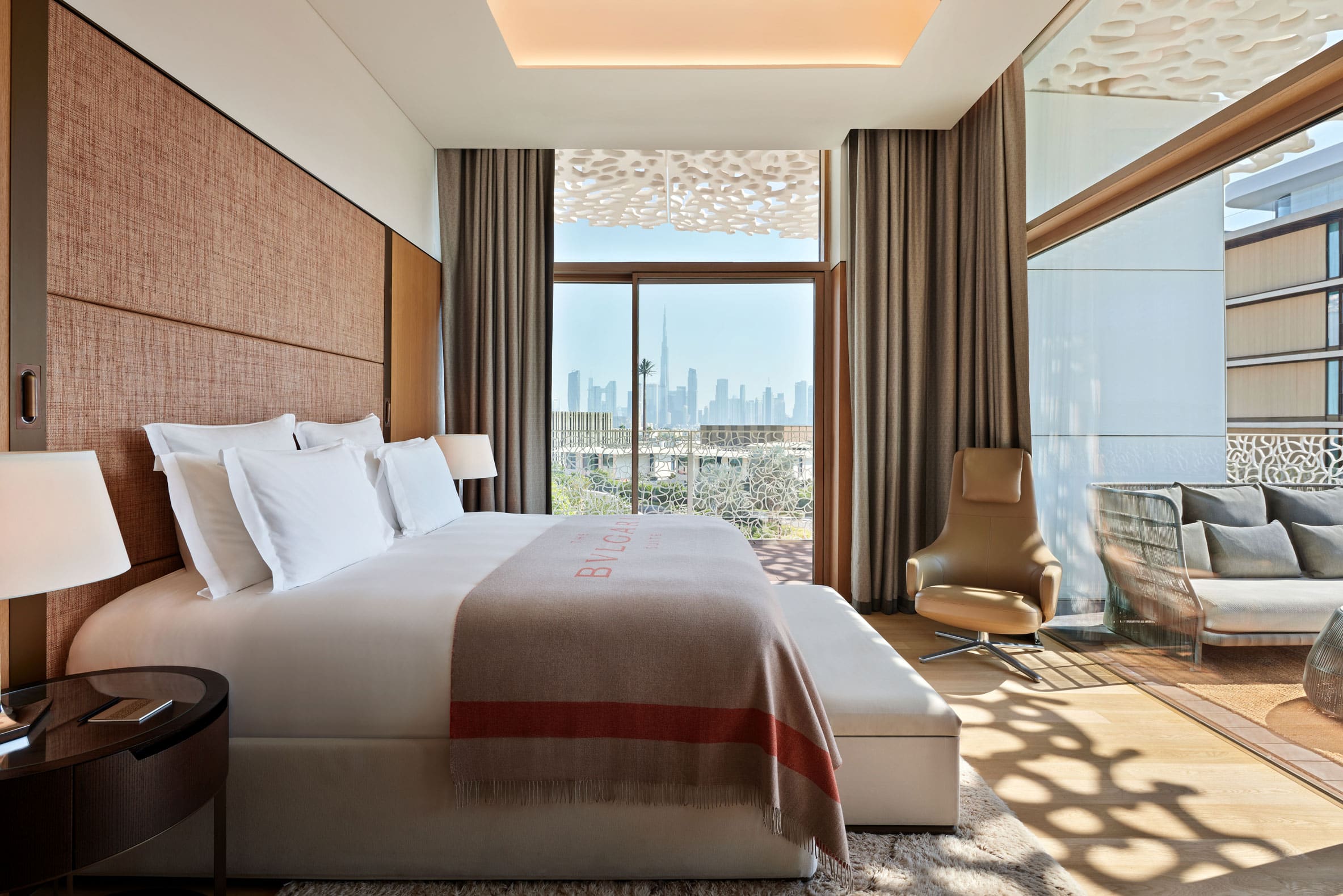Luxury suite at Bulgari Resort Dubai with skyline views of the Burj Khalifa for Easter 2026 stay.