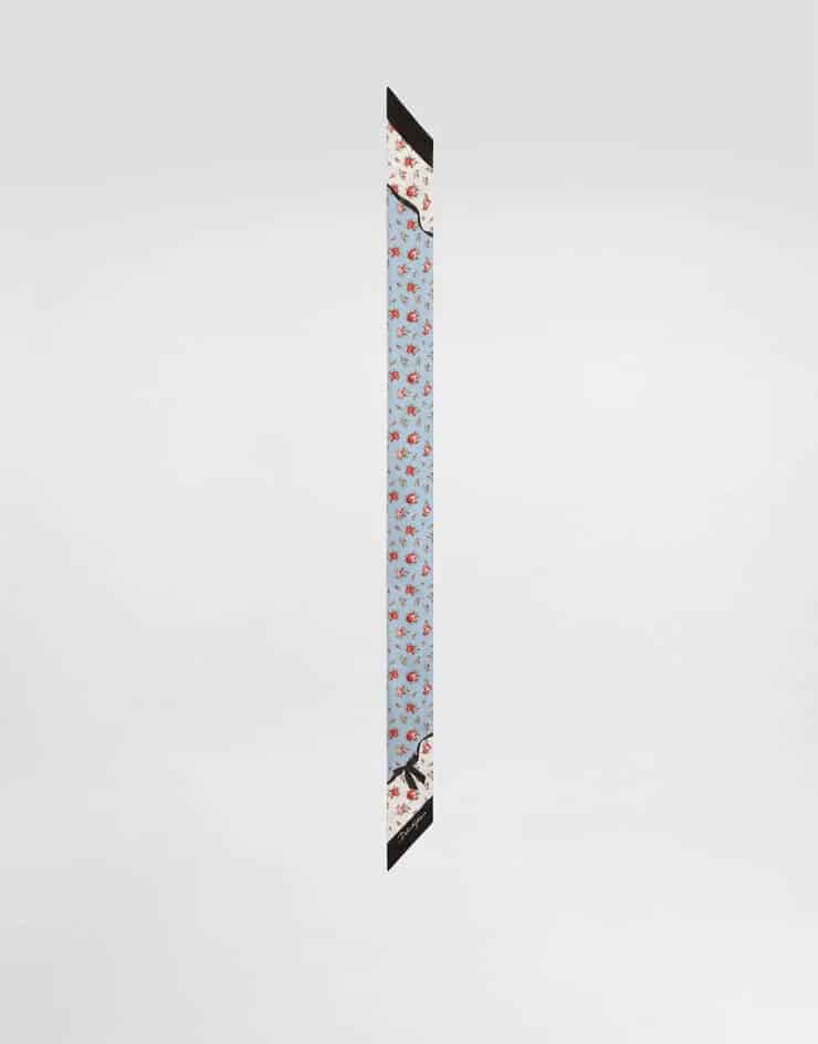 rectangular and slim Dolce and Gabbana silk scarf in blue, white and accents in black with floral prints