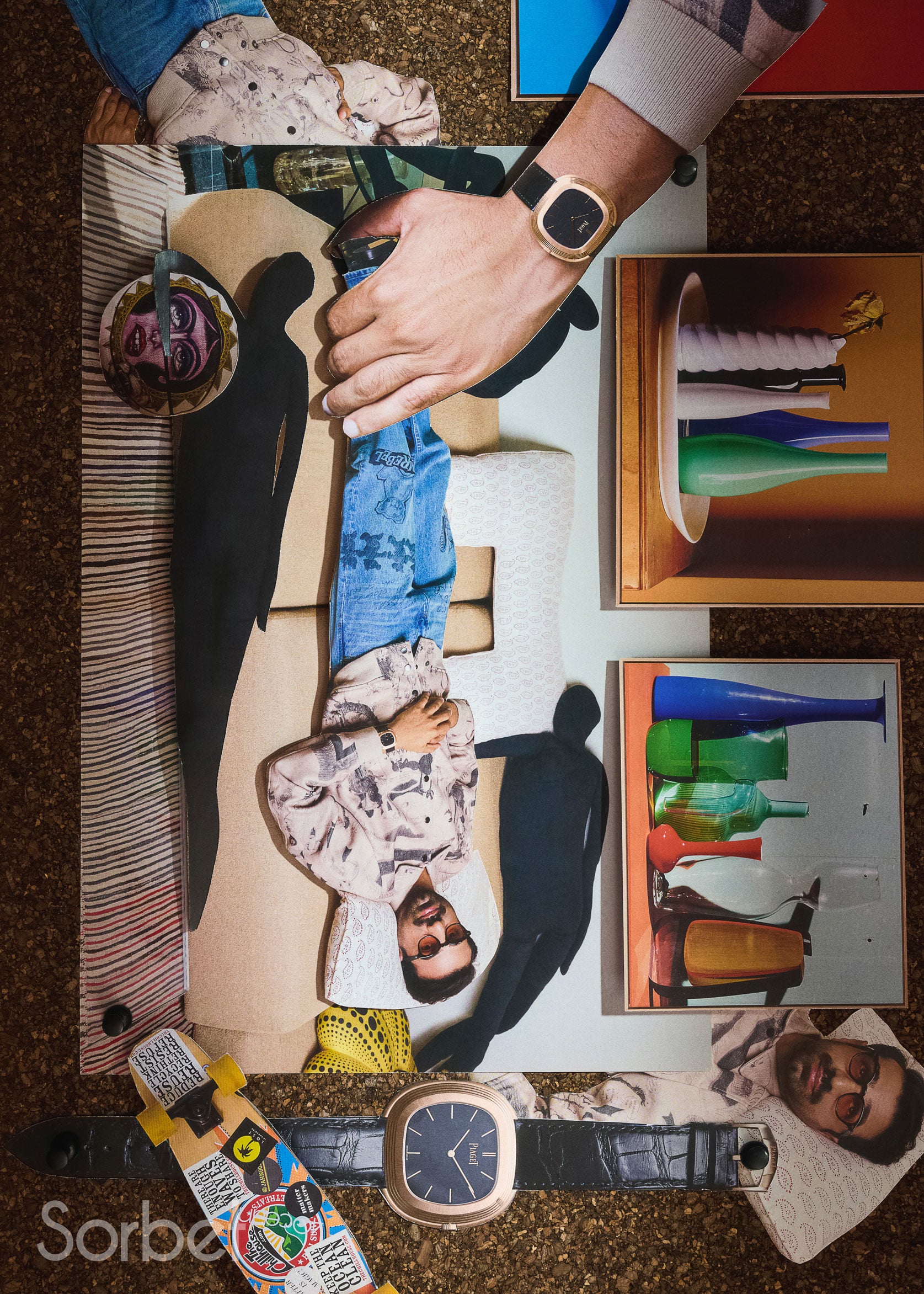 Surrealist collage of filmmaker Abdulla Alkaabi laying upside down wearing blue denim jeans and white graffiti jacket, with Piaget Warhol watches