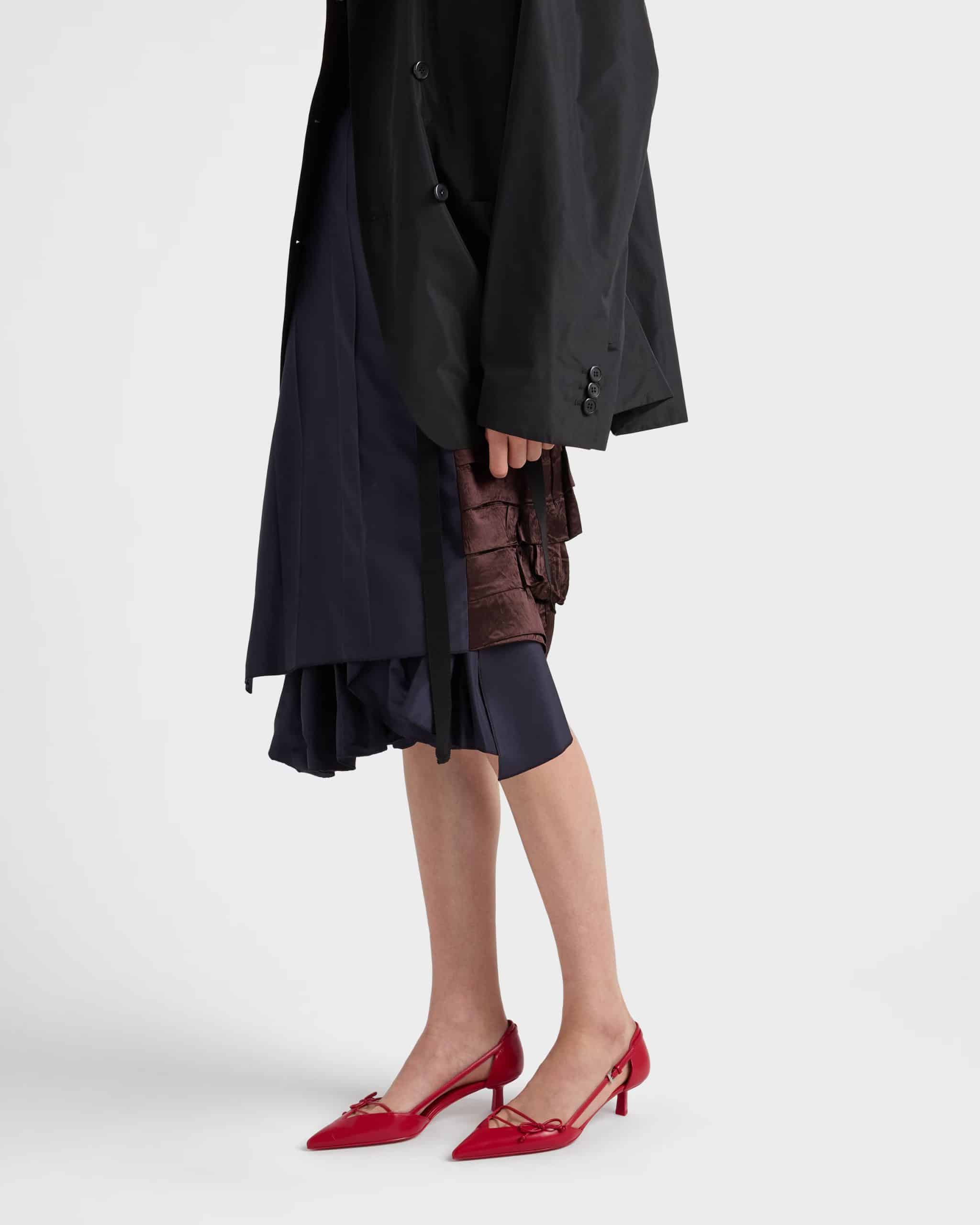 Prada red open side leather pumps worn by Female model