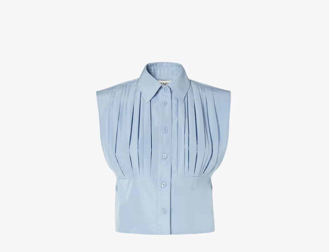 Fendi light blue sleeveless and pleated collared shirt against a white background