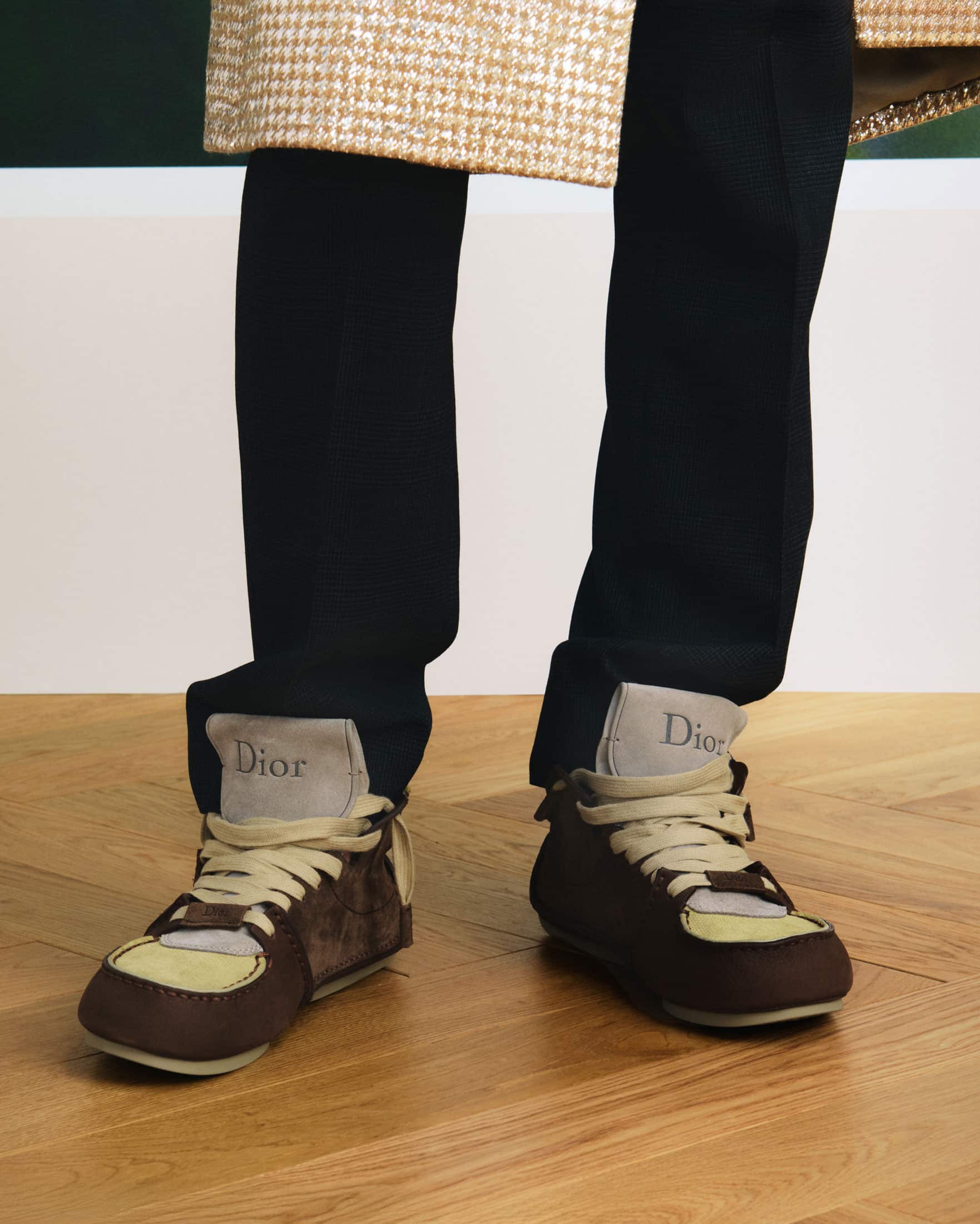 Dior Roadie boots summer 2026 by Jonathan Anderson in brown and beige laces worn by male model